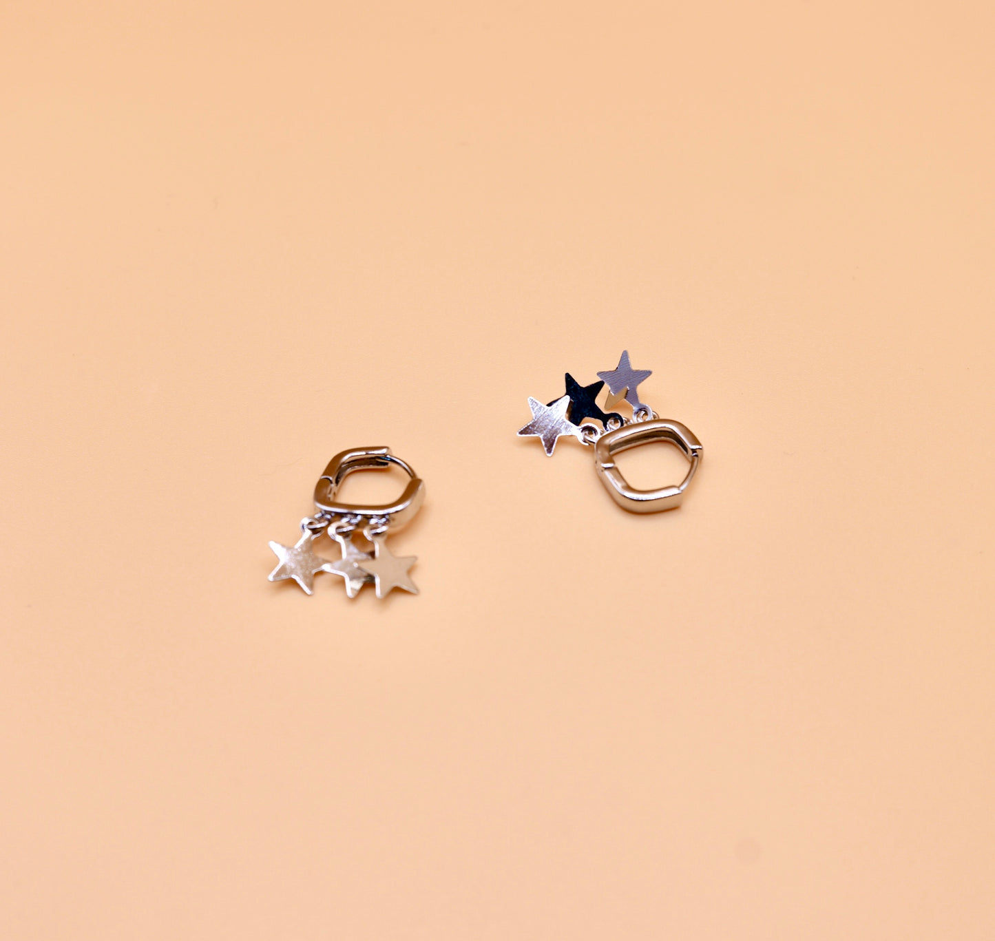 "Charlotte" Huggie star earrings in Silver