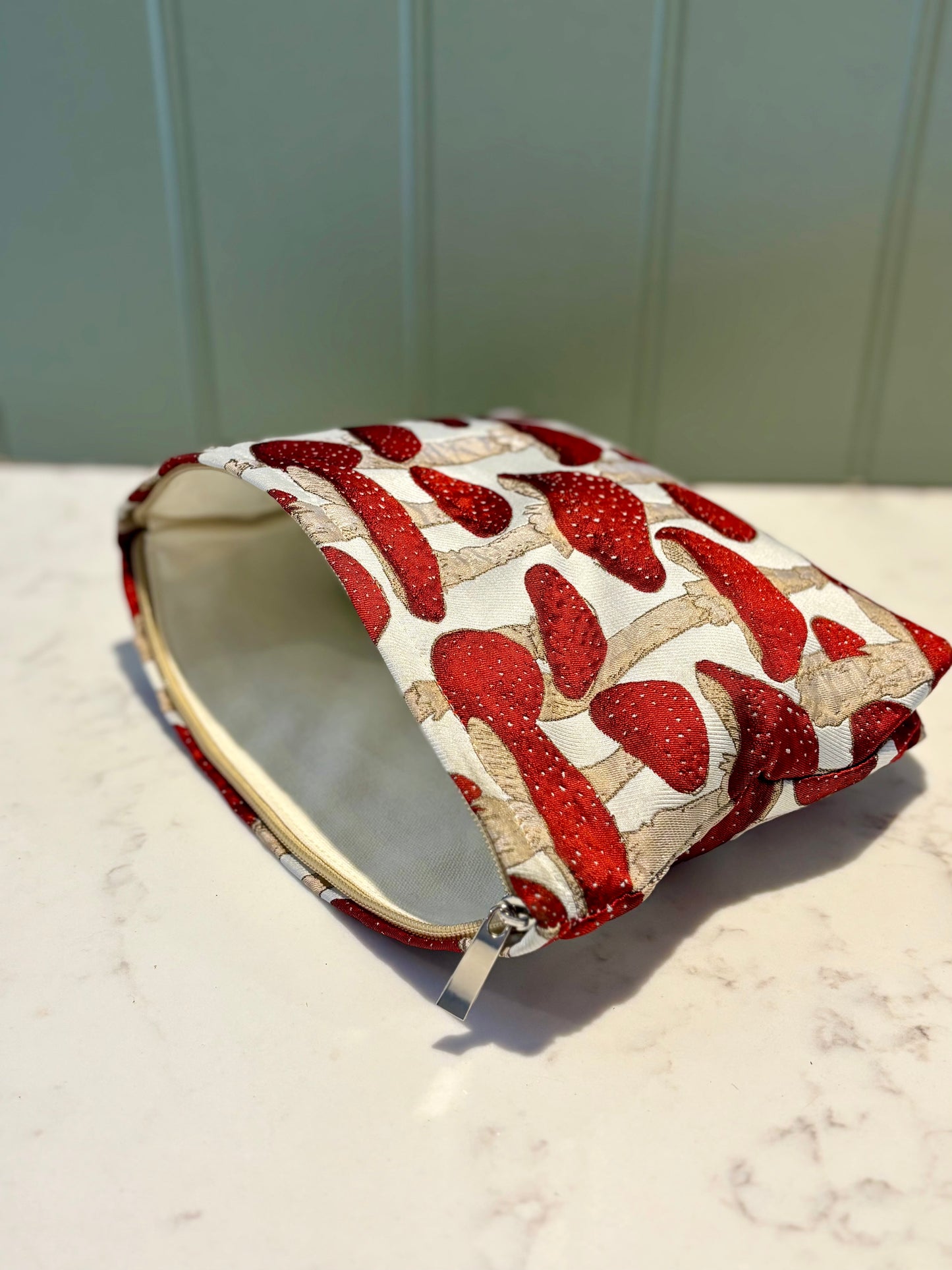 Mushroom makeup bag in red