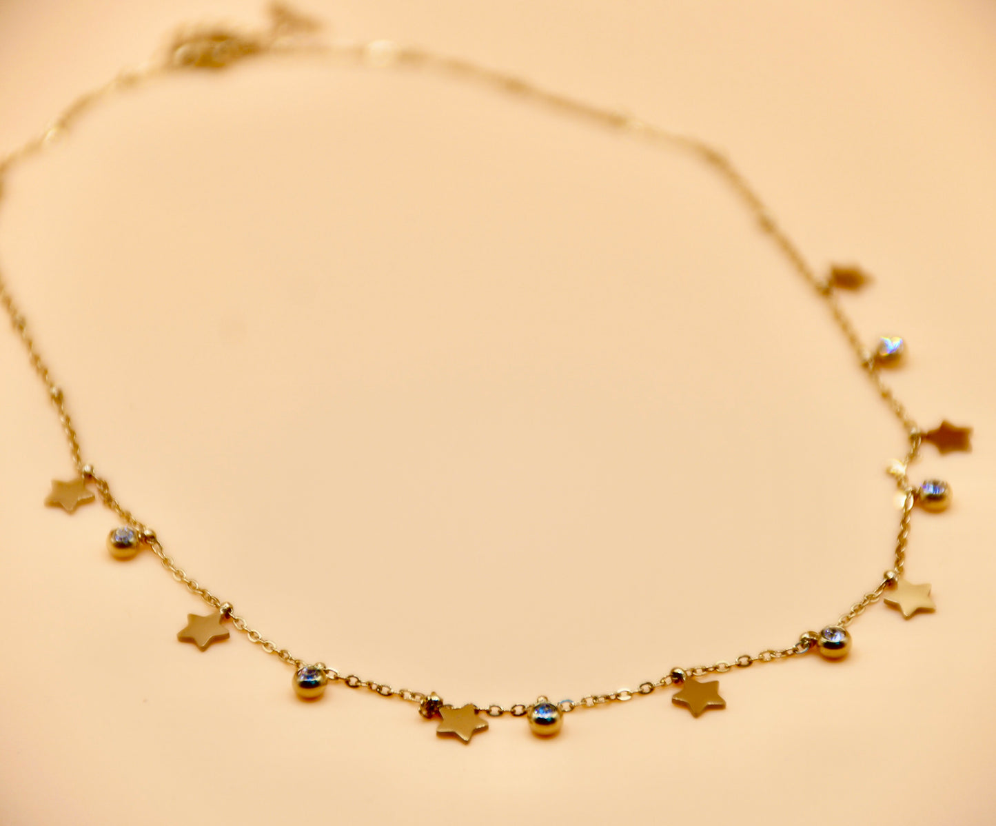 Star gold charm necklace