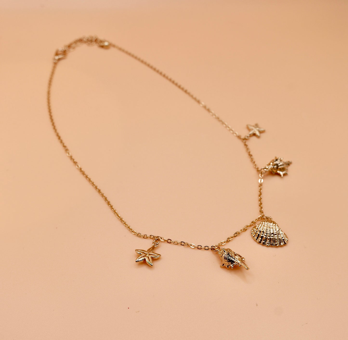 Shell gold charm necklace