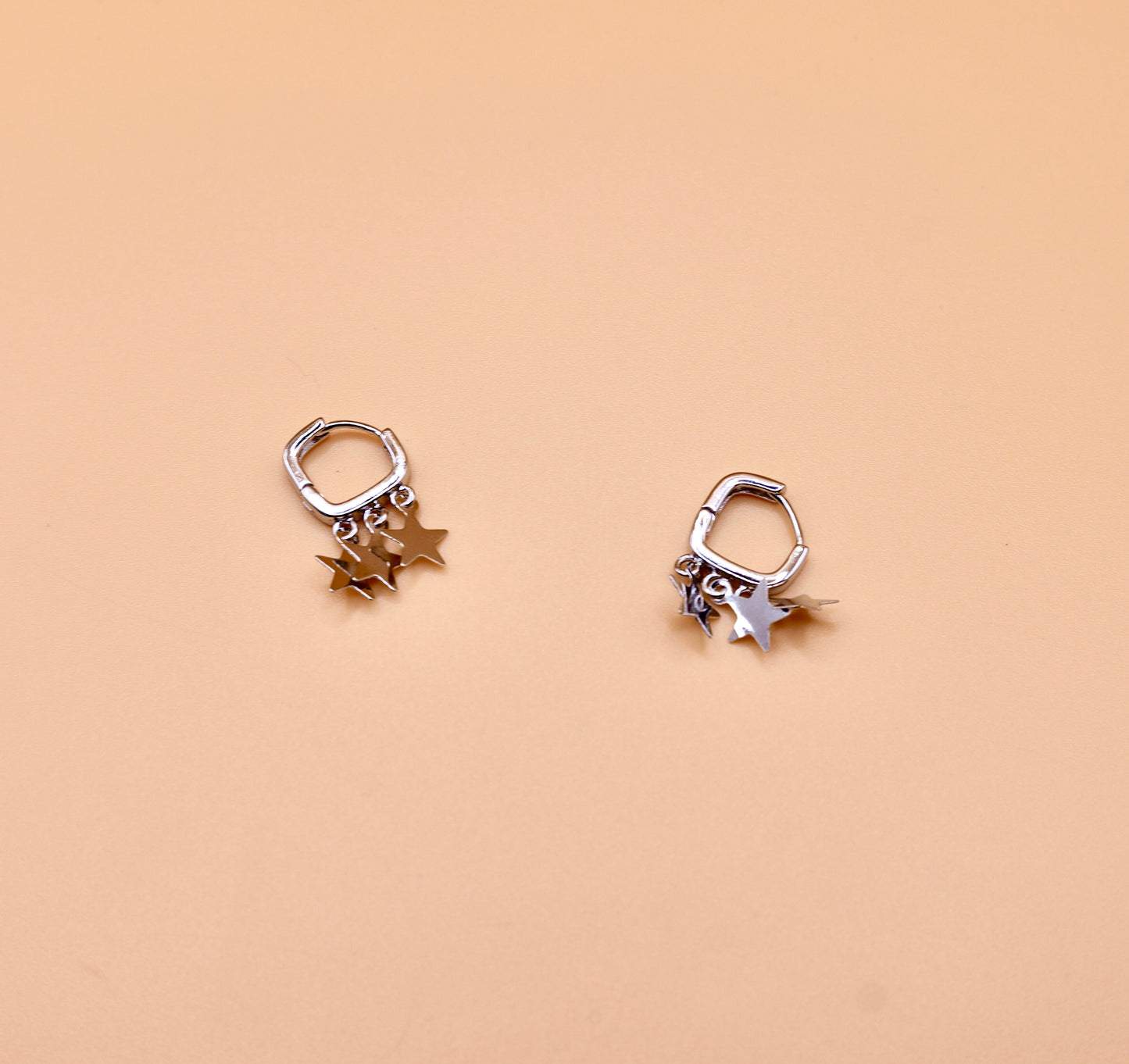 "Charlotte" Huggie star earrings in Silver