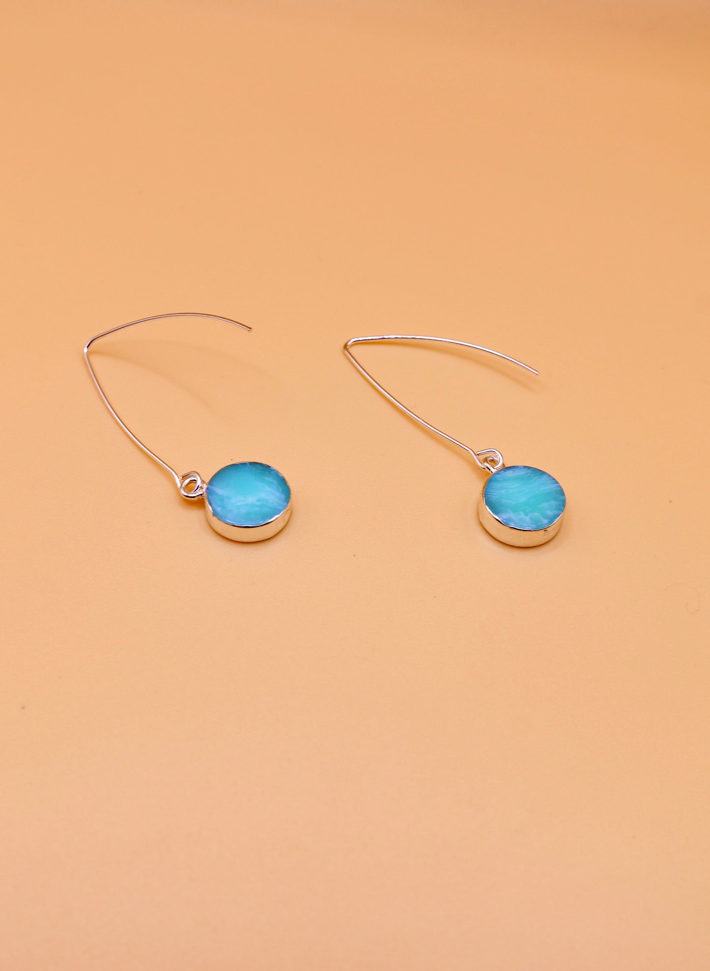 Drop earrings in silver with blue stone