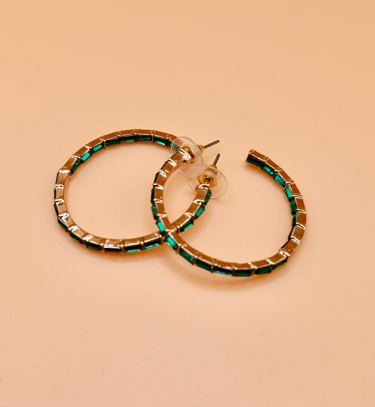 Green gem hoop earrings in gold