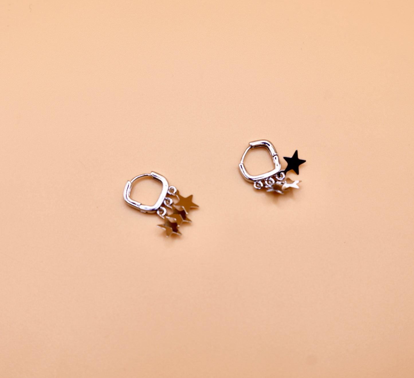 "Charlotte" Huggie star earrings in Silver