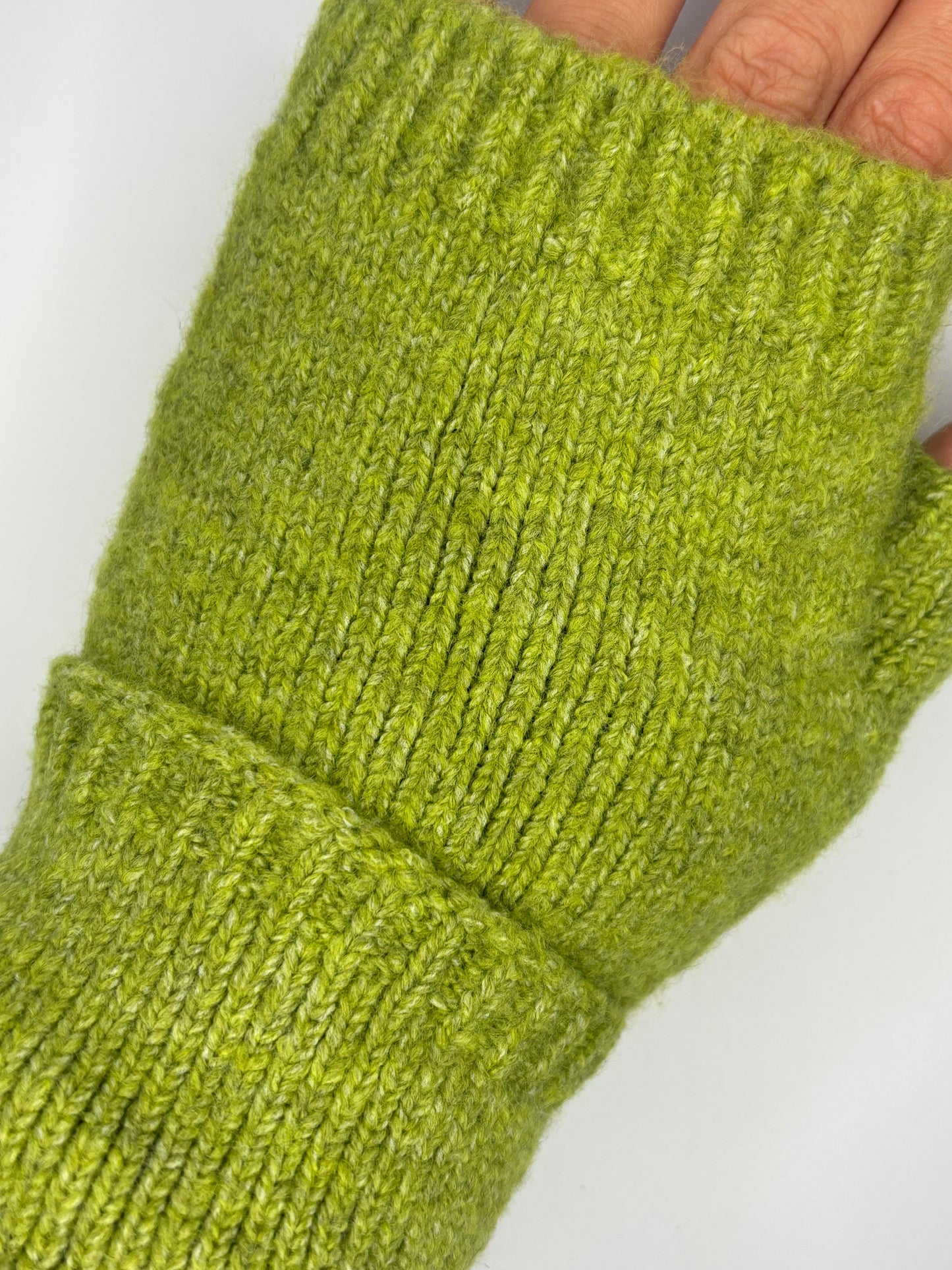 Green fingerless gloves