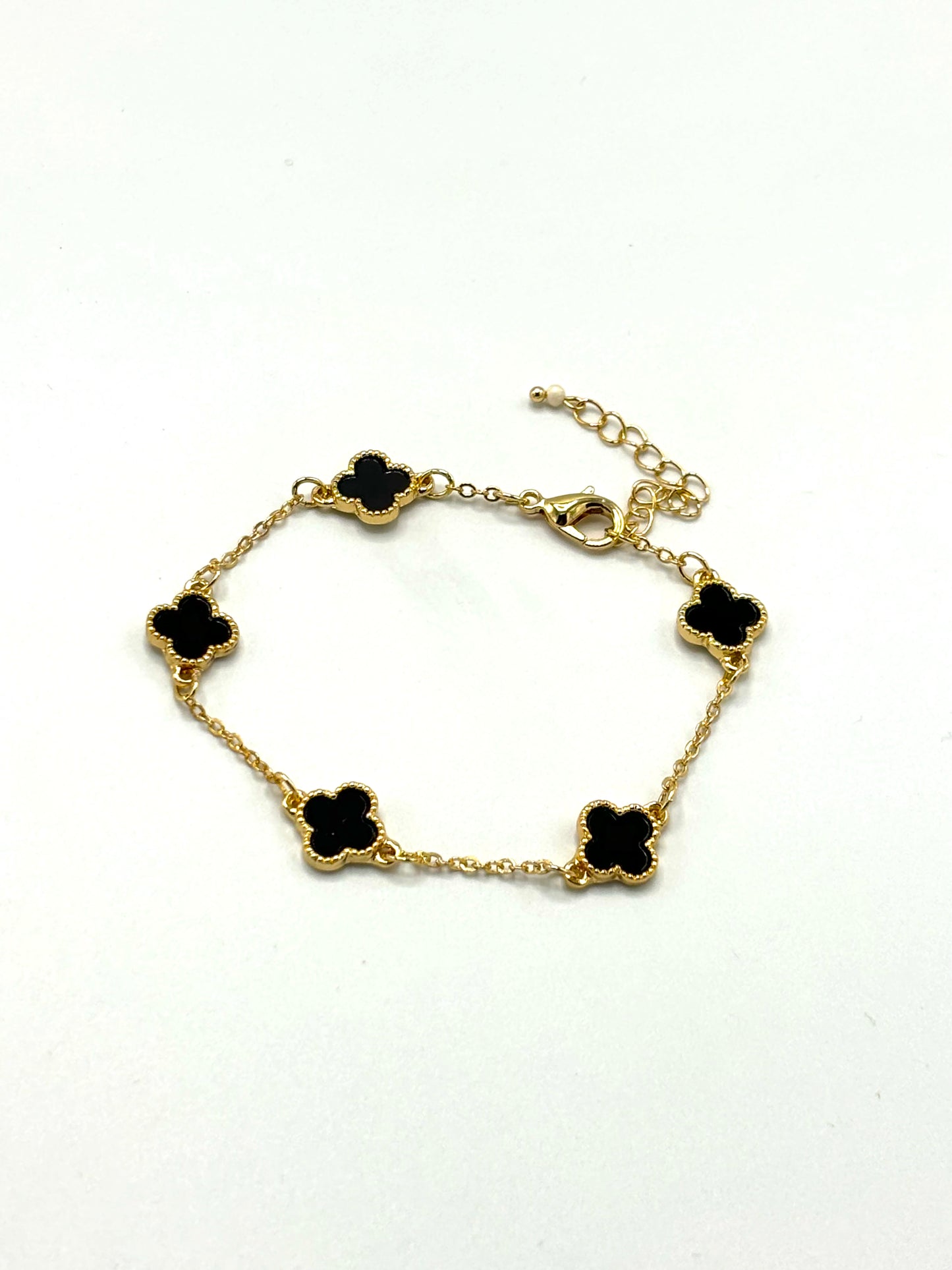 Clover black bracelet in gold