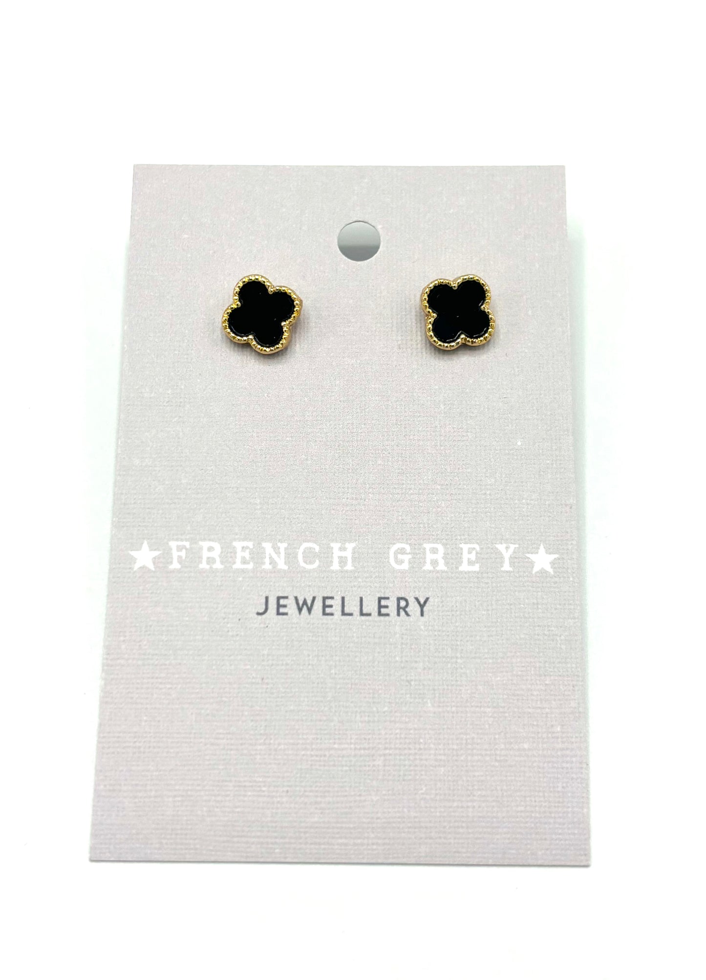 Clover stud earrings in gold and black