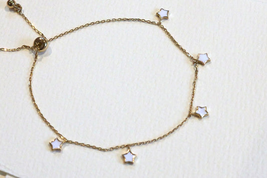 Enamel star bracelet in gold